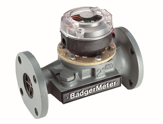 Badger Meter Industrial Turbine Turbo Model flow meter — flanged cast-iron housing with bronze head and a clear-domed register on top